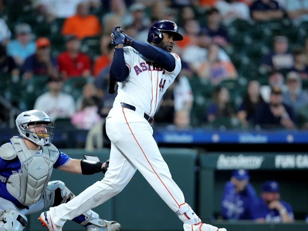 Houston Astros batter facing off against a San Diego Padres pitcher at Petco Park during a Sunday Night Baseball game
