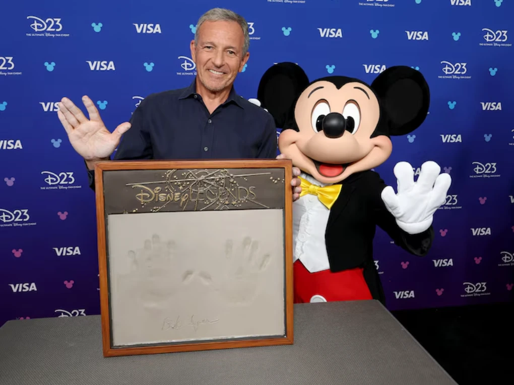 Disney Legends 2026 honorees graphic featuring Anne Hathaway, Bob Iger, and Dwayne Johnson